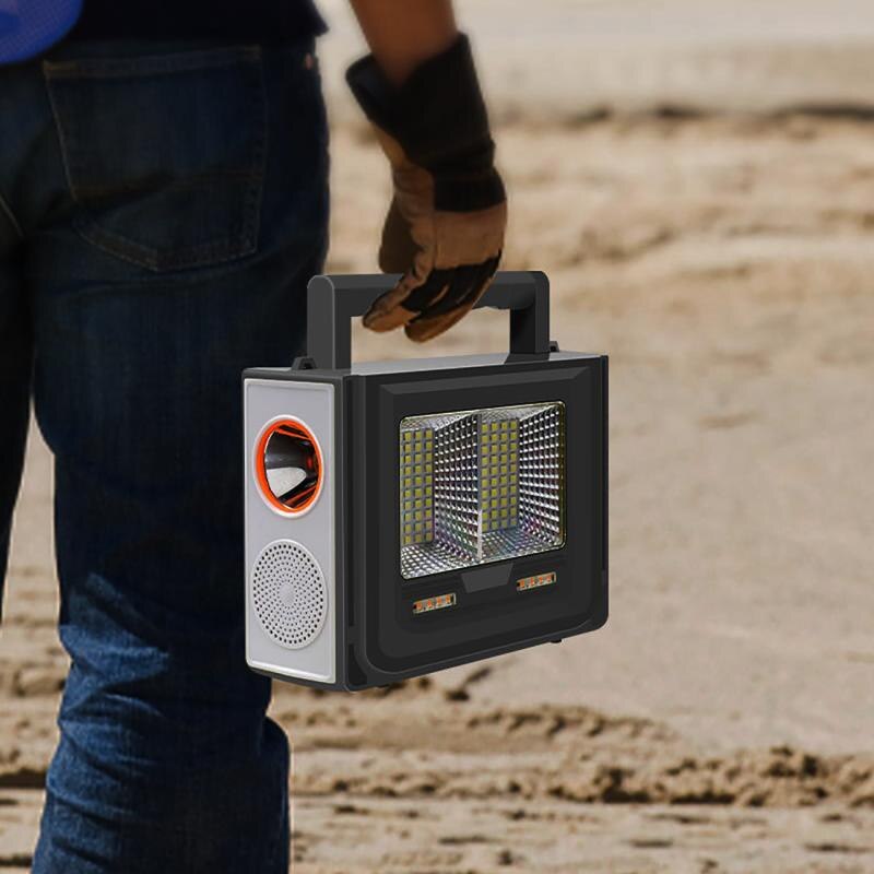 Generatore di energia di emergenza a luce solare Piccolo sistema Dispositivo di carica della luce integrato per musica portatile all'aperto