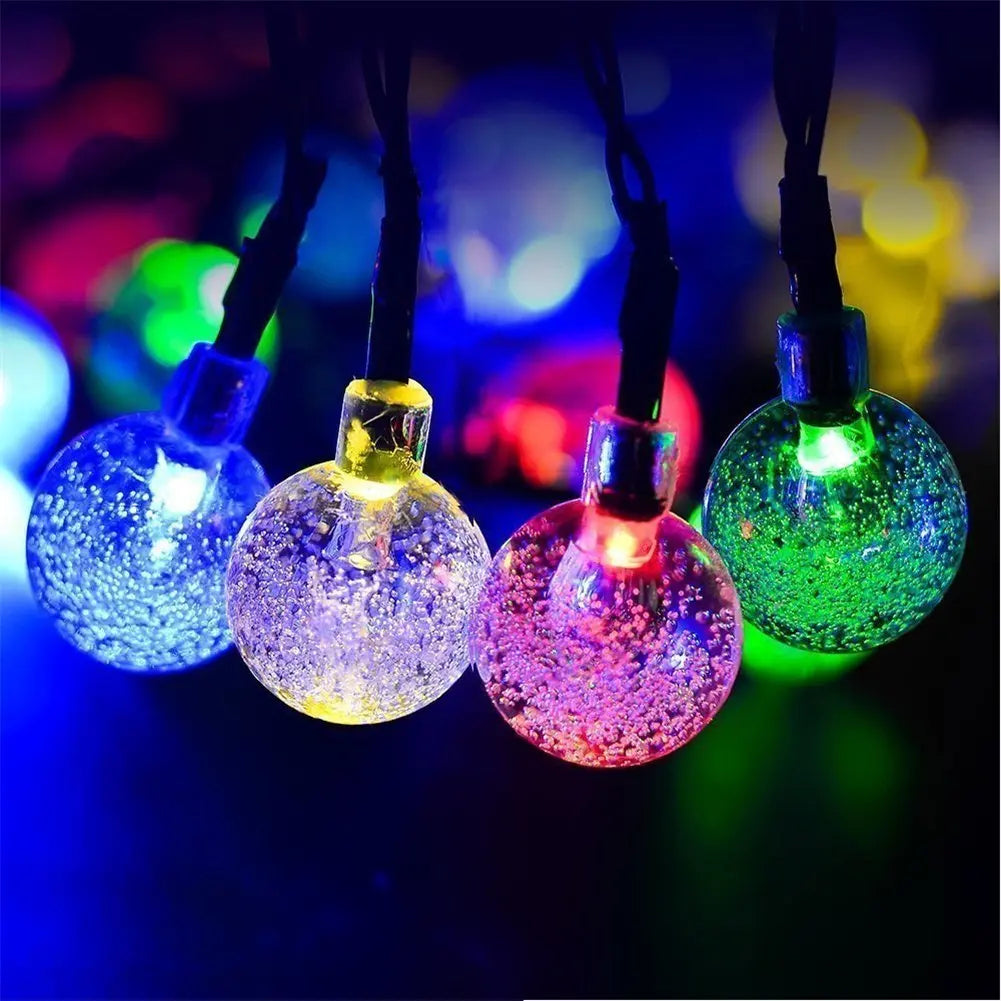 Crystal ball solar lamp with 50 LED lights for fairy lights and outdoor decorations.