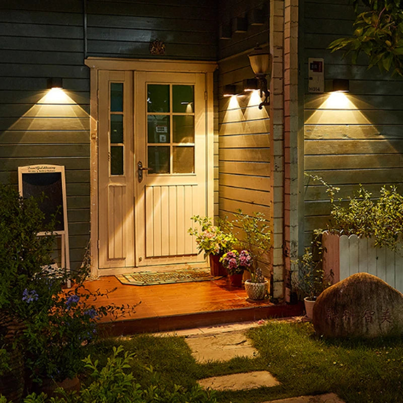 LED Solar Light, Solar Quartet Wall Lamp: modern, waterproof, and solar-powered outdoor lighting with LED bulbs and control sensor.