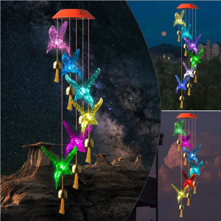Colorful solar-powered wind chimes with LED hummingbird design for patio, yard, or garden.