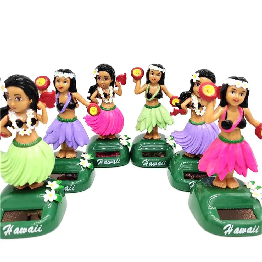 Solar Dancing Hawaii Girl Hulas Shaking Head Toy, Solar-powered dancing Hawaiian girl toy with hula skirt and shaking head.