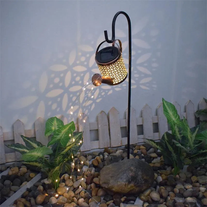 Elegant outdoor solar light with watering can design, perfect for garden lighting and yard decoration.