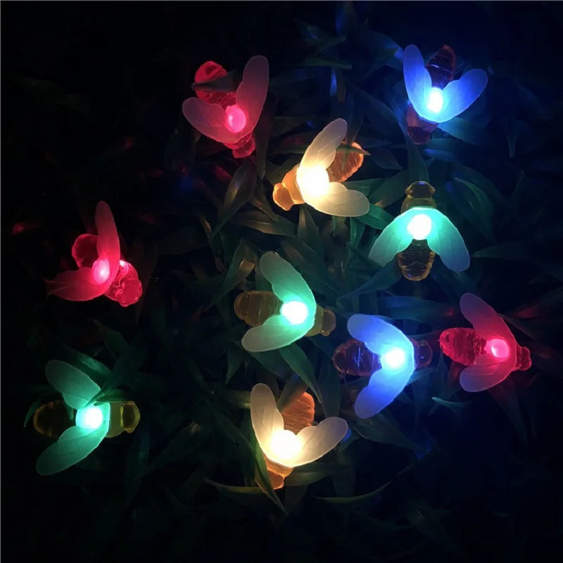 Solar-powered string lights with LED bulbs, waterproof, and dimmable (no). Includes 50 LEDS.