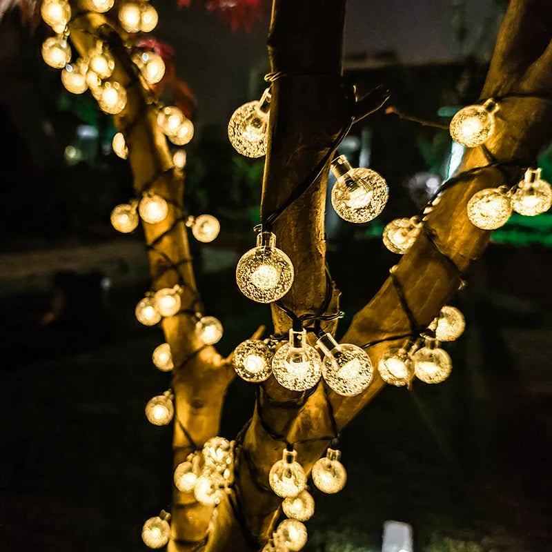 Elegant string lights for evening ambiance in gardens, patios, and porches.