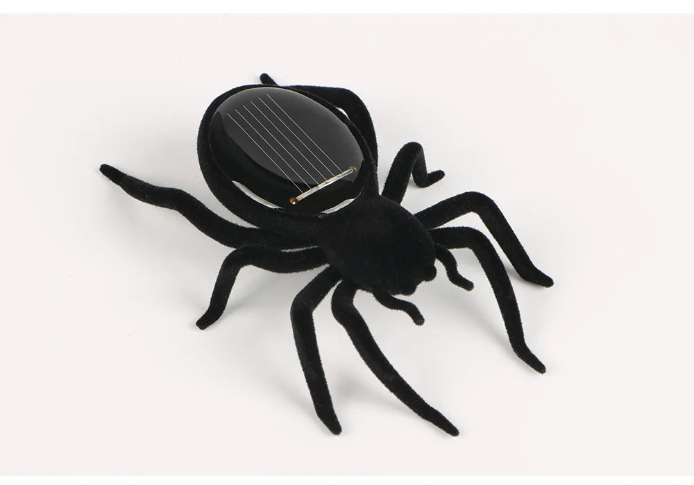 Solar-powered spider toy runs on sunshine, fun for all ages.