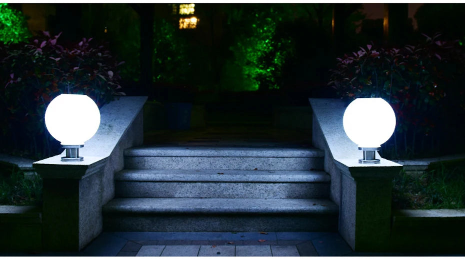 Sleek LED solar post lamp with stainless steel body and round ball shape, ideal for outdoor use.