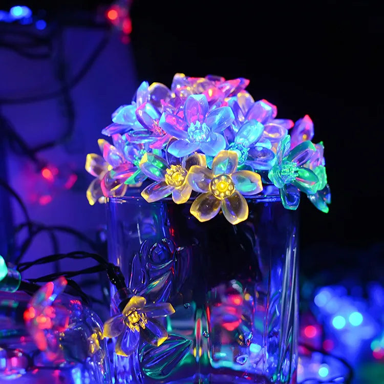 18 Styles Solar Garlands light, Solar-powered garden decoration with adjustable string lights and flower-shaped lamp accents.