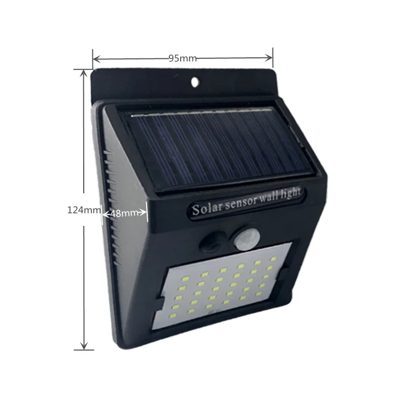 Outdoor 100 LED Solar Light, Outdoor wall light with solar-powered motion sensor and waterproof design for nighttime illumination.