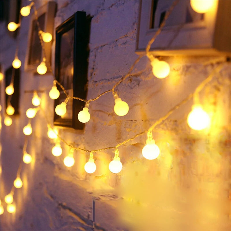 10M Ball LED String Light, String of 10M LED lights ideal for outdoor celebrations, featuring a garland design and whimsical fairy light effect.
