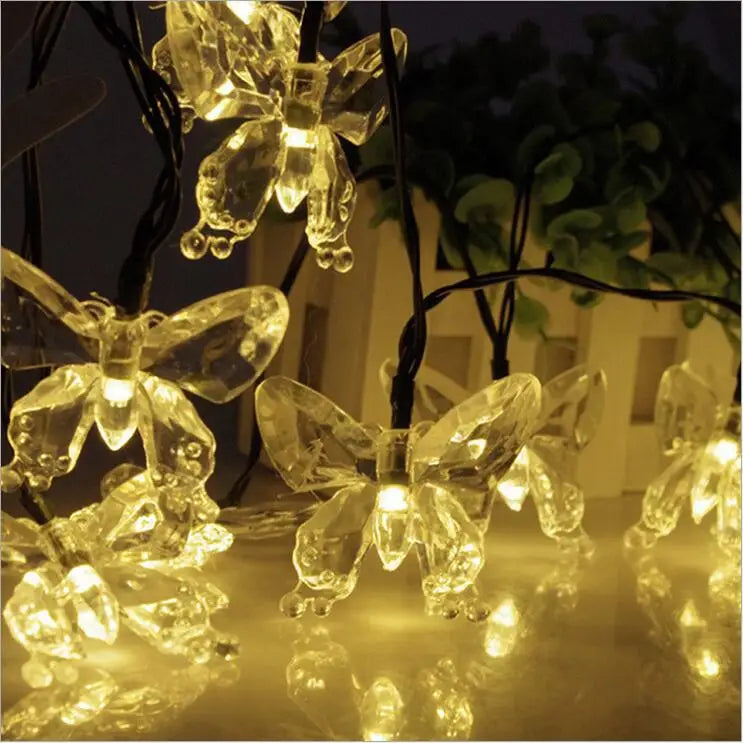 18 Styles Solar Garlands light, Solar-powered LED lights in peach flower design for outdoor use as garden or Christmas decorations.