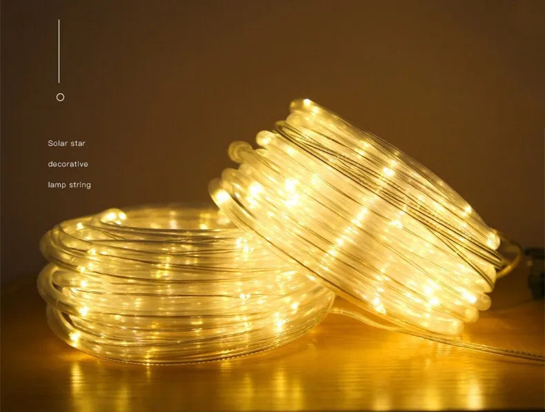 300LED Solar Rope Strip Light, Solar-powered fairy lights with stars and sparkles for outdoor use.