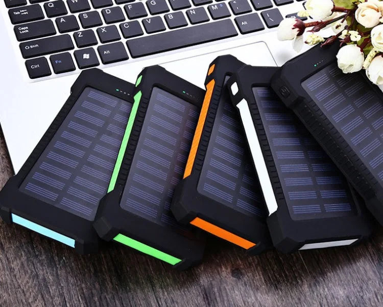 Wireless charging power bank with solar panel, water-resistant and compact design.