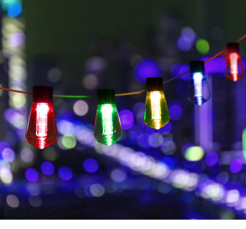 Waterproof LED solar string lights for outdoor use, perfect for holiday decorations or patio lighting.