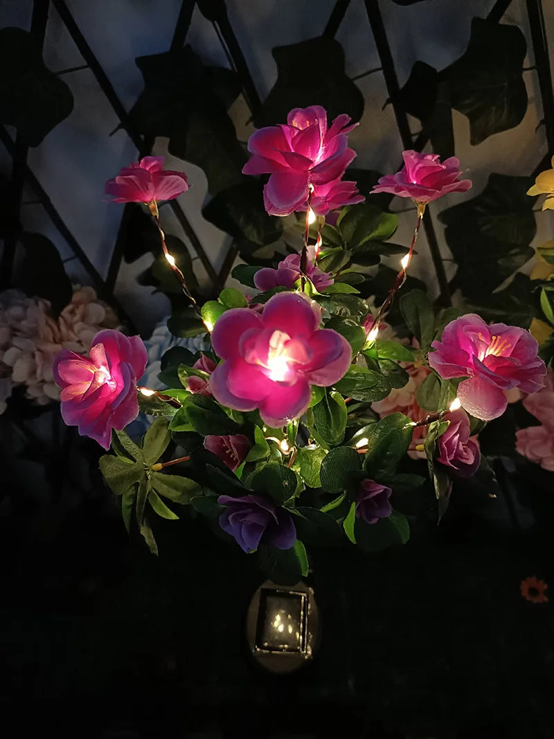 Elegant LED lamp illuminates azalea flowers and surrounding landscape, perfect for gardens, yards, or holiday decor.