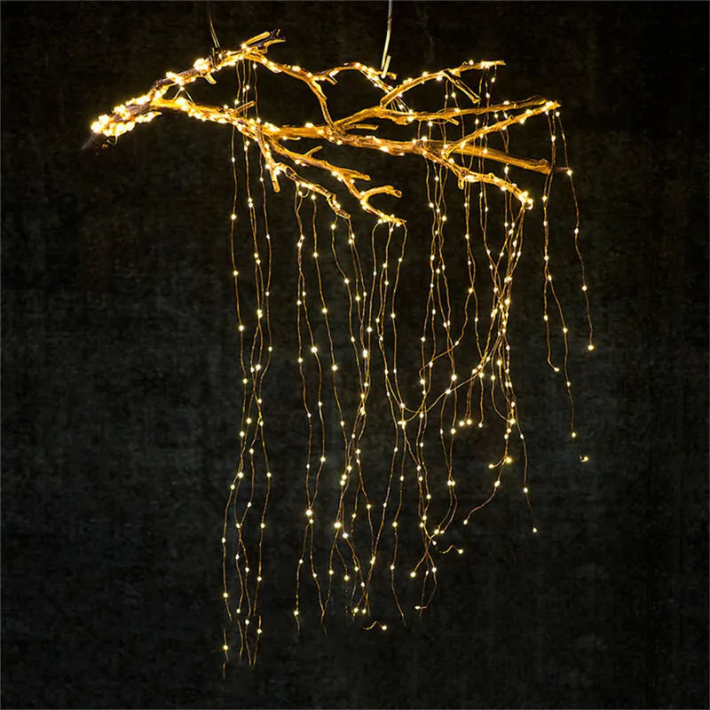 Outdoors Solar Copper String Light, Twinkling lights adorn flowers, plants, and structures, creating a starry effect.