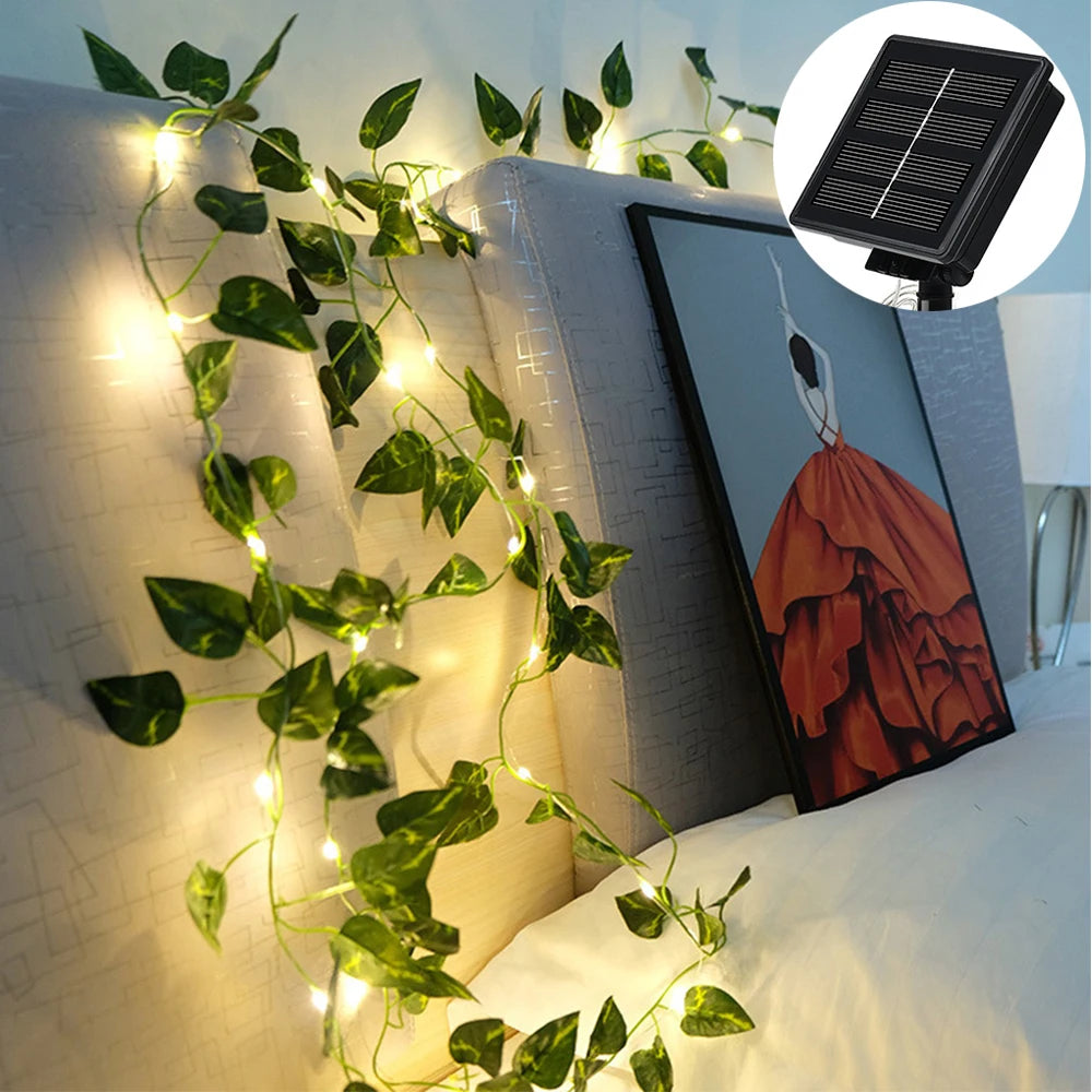 Elegant solar-powered garland with copper LED lights, perfect for outdoor gardens and floral arrangements.