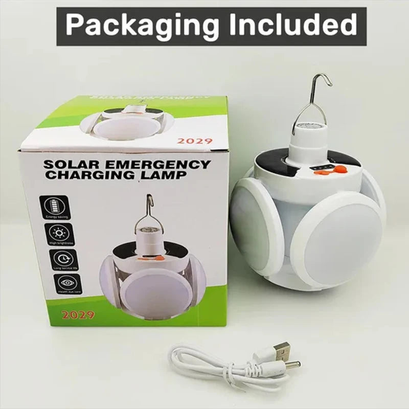 Solar Outdoor Folding Light, Packaging includes Solar Emergency Charging Lamp with rechargeable LED bulb and USB charging port.