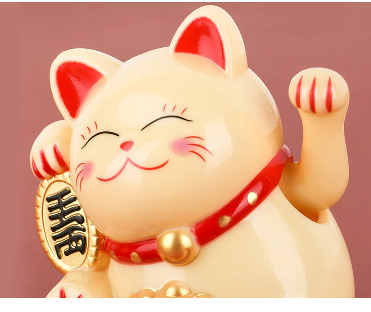 Solar Powered Maneki Neko Lucky Cat, Solar Powered Maneki Neko cat figurine with a package note conversion guide.