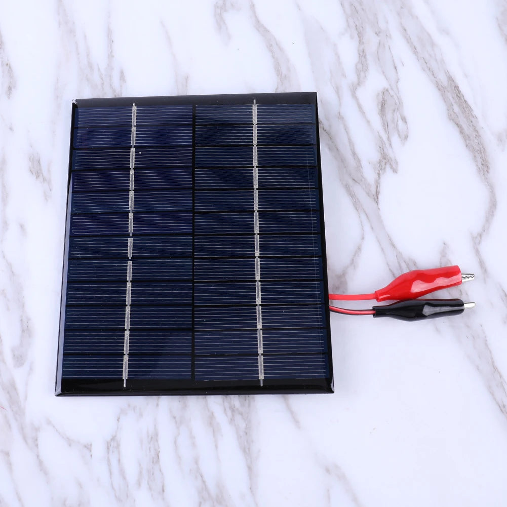 Waterproof solar panel for outdoor use, charges 9-12V batteries with 5W power and durable design.