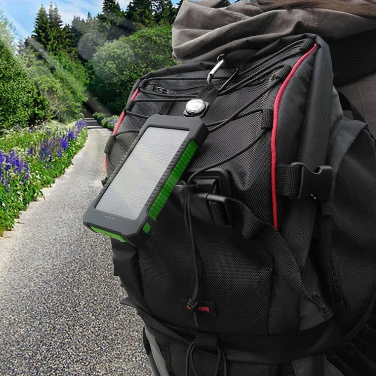 Waterproof, wireless charging power bank with solar panel and compass for outdoor use.