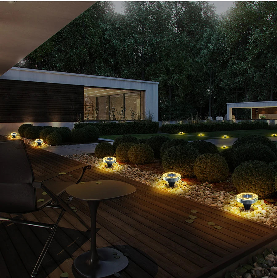 Solar Powered Ground Light, Solar-powered lights charge during the day, illuminating for 8-12 hours at night with bright LED lighting.