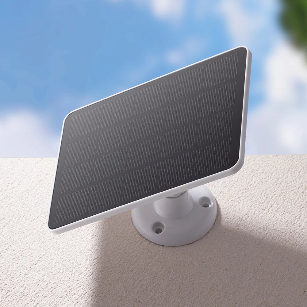 Portable solar charger for security cameras and home lights with micro USB and Type-C ports.