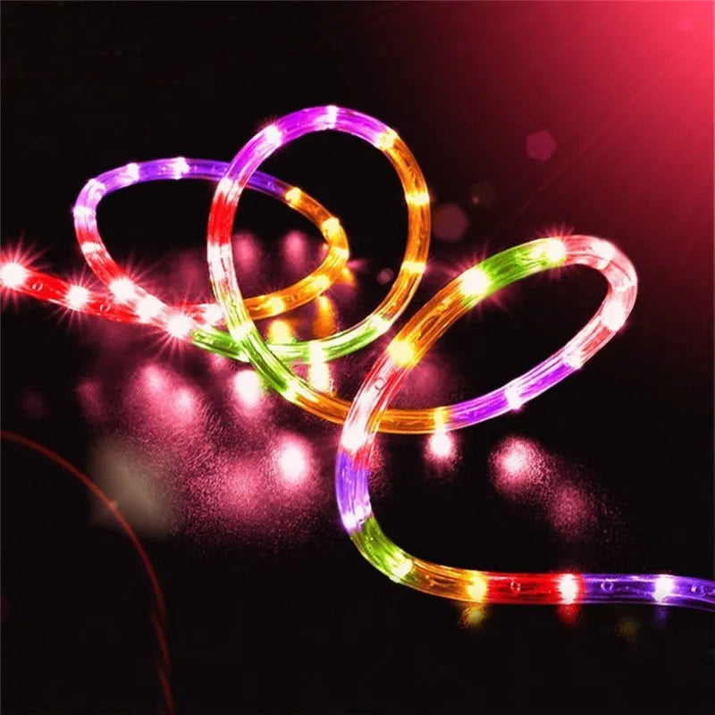String lights with 50-100 strands, solar-powered, waterproof, ideal for outdoor events like fairy, holiday, or Christmas parties.